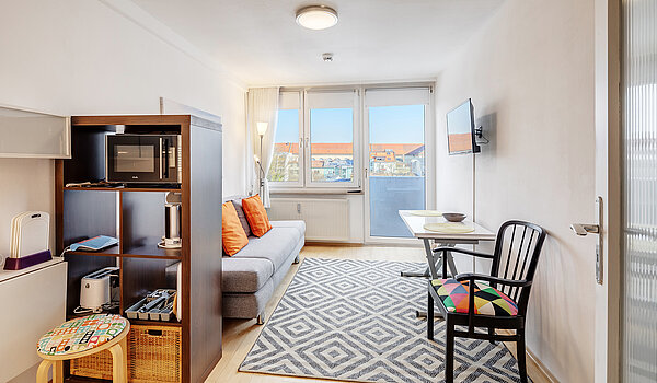 Lapos a  címen 1 Szoba | München-Maxvorstadt | 70397 | Wohn- / Schlafbereich