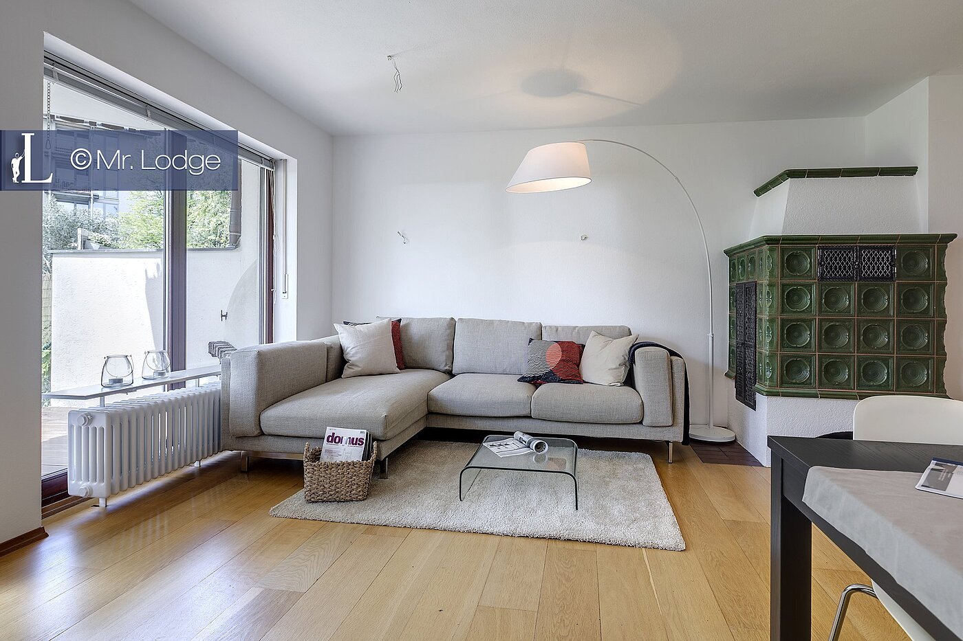 Földszinti lakás a  címen 2 Szobák | München-Harlaching | 1704ML6 | Wohnzimmer mit Kachelofen