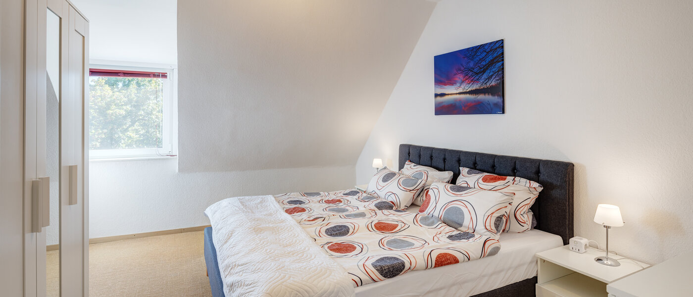 Podkrovní byt München Nymphenburg 01 Ložnice 13654