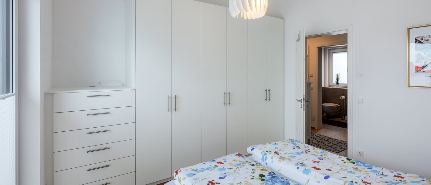 Penthouse byt Putzbrunn 03 Ložnice 14256