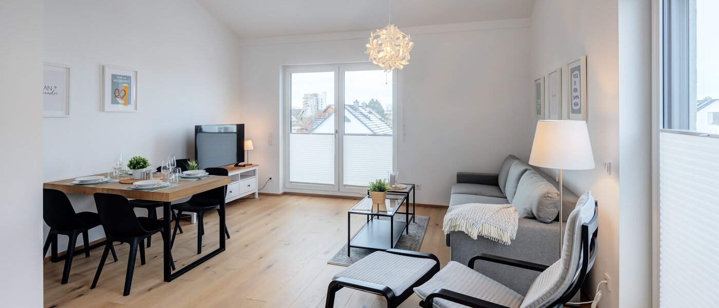 Penthouse byt Putzbrunn 01 Obývací prostor 14256