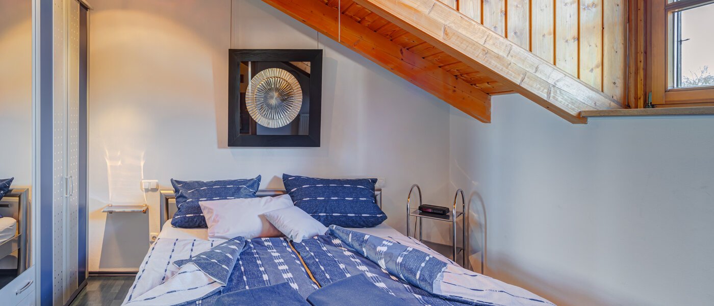 Podstrešno stanovanje München Am Hart 01 Spalnica 5630