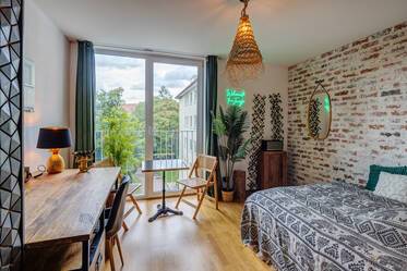 Til leje: møbleret lejlighed i rolig bagbygning