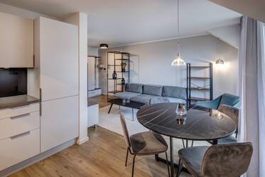Meget flot møbleret Loftslejlighed i Milbertshofen