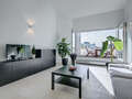 Апартамент с покривна тераса München Arabellapark 02 Living 7279